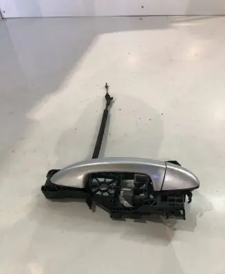 Rear door exterior handle/bracket