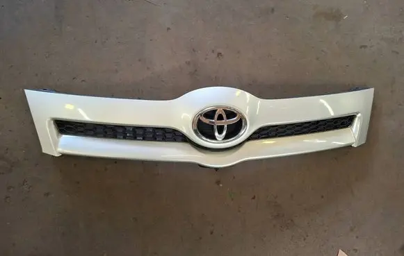 Toyota Corolla E120 E130 Front bumper upper radiator grill 531110F020