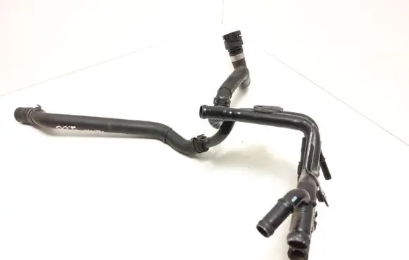 Audi Q3 8U Engine coolant pipe/hose 04L121064AF