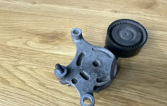 Peugeot Partner Generator/alternator belt tensioner 950007