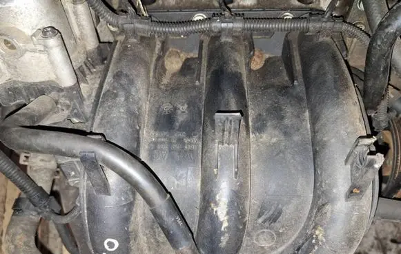 Volkswagen Polo IV 9N3 Intake manifold 03d129766l