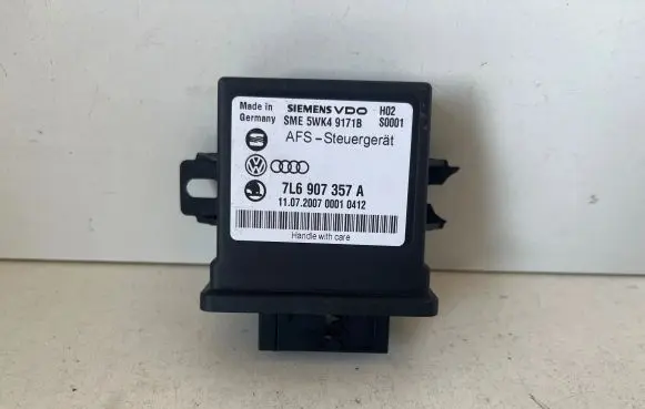 Volkswagen Touareg I Light module LCM 7L6907357A 5WK49171B 1107200700011