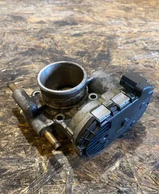 Opel Tigra B Throttle valve 0280750133 24420536