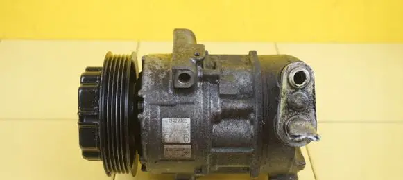 Opel Corsa E Air conditioning (A/C) compressor (pump) 13427705 B10XFT