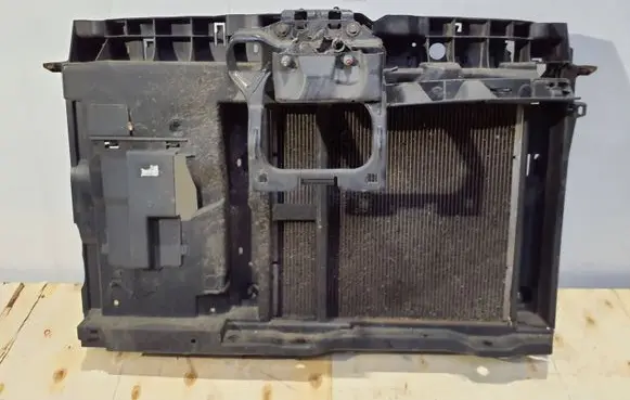 Radiator support slam panel