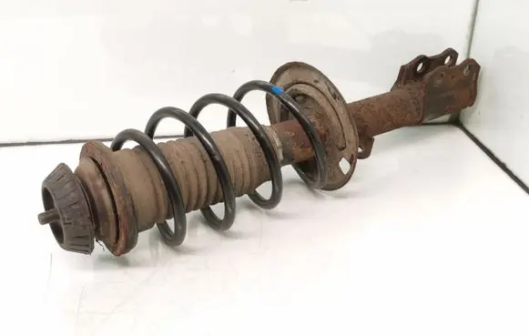 Toyota Yaris Front shock absorber with coil spring