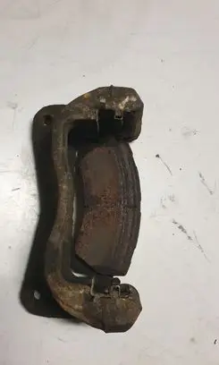 Subaru Outback Front Brake Caliper Pad/Carrier 