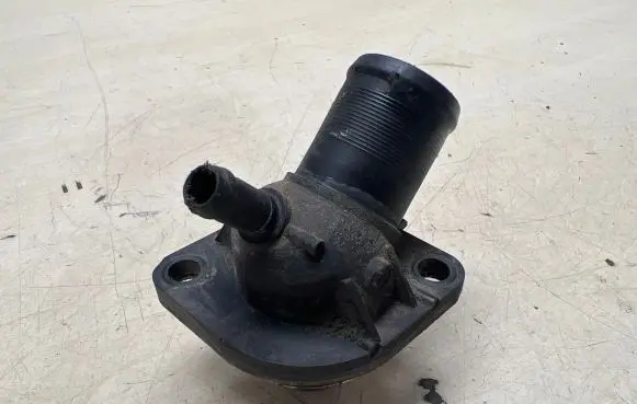 Thermostat/thermostat housing