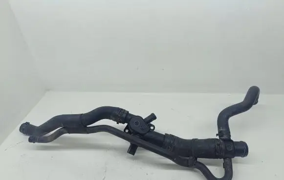Volkswagen Touran I Engine coolant pipe/hose 06A121133AC