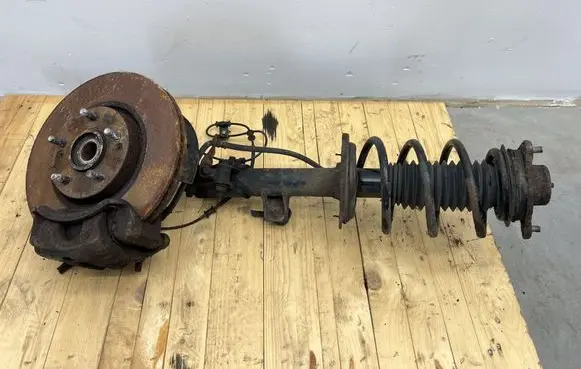 Front shock absorber with coil spring