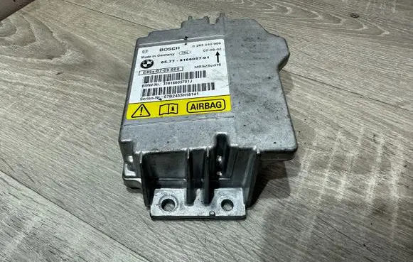BMW 1 E81 E87 Airbag control unit/module 9166057 31916605701J 0285010066