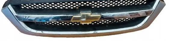 Chevrolet Tacuma Front bumper upper radiator grill 96399717