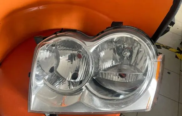 Jeep Grand Cherokee (WK) Headlight/headlamp 5515667