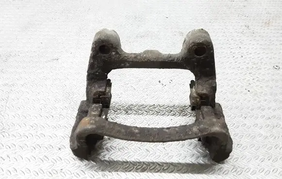 Volkswagen PASSAT B6 Brake caliper pad carrier rear 