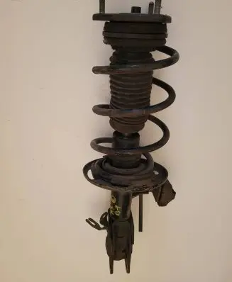 Mazda 3 III Front shock absorber with coil spring
