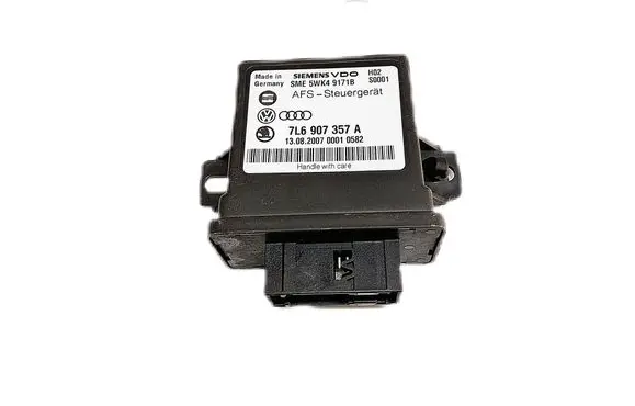 Volkswagen Touareg I Light module LCM 7L6907357A