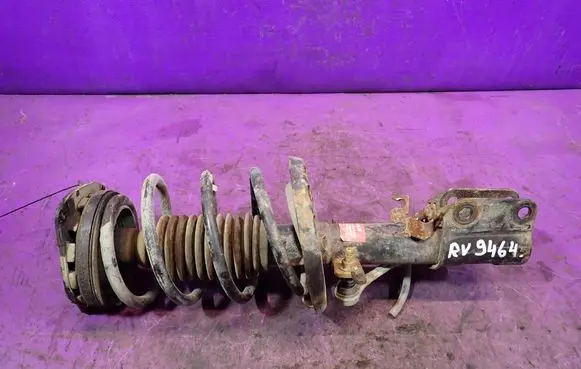 Renault Megane III Front shock absorber with coil spring 