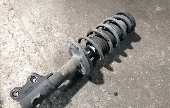 Buick Encore I Front shock absorber with coil spring 95266857