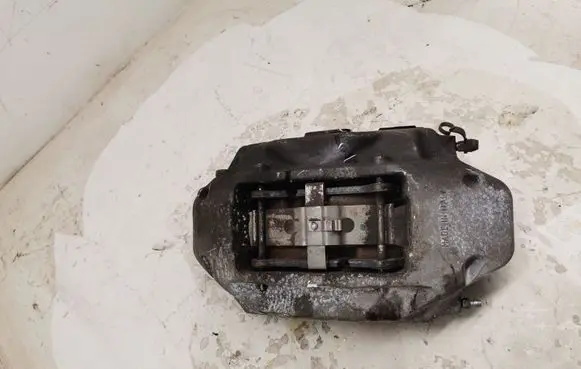 Volkswagen Touareg II Front brake caliper 7P6615106