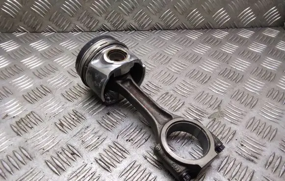 Piston with connecting rod