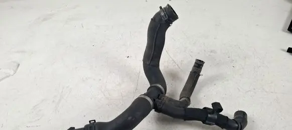 Volkswagen Jetta VI Engine coolant pipe/hose 1K0121049