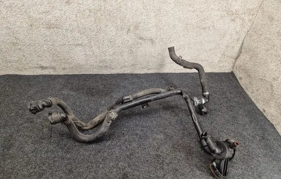 Volkswagen PASSAT B7 Engine coolant pipe/hose 03L121065AJ 03L121111AE 3AA122073A