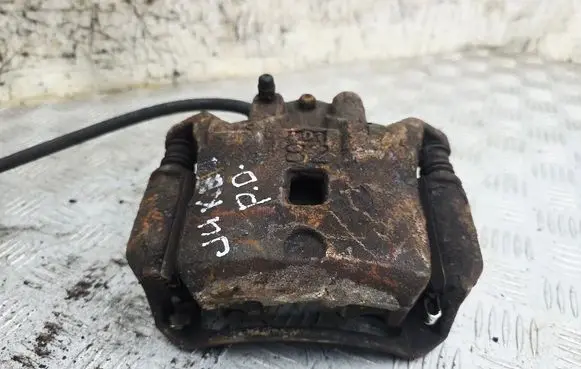 Nissan Juke I F15 Front brake caliper