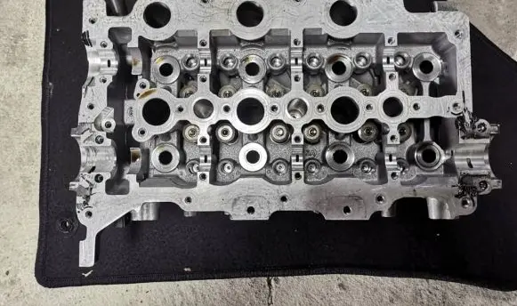 Jaguar XF X250 Engine head PM9X2Q6C064CA