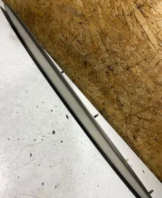 Trunk door license plate light bar