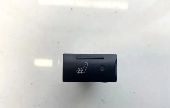 Seat heating switch