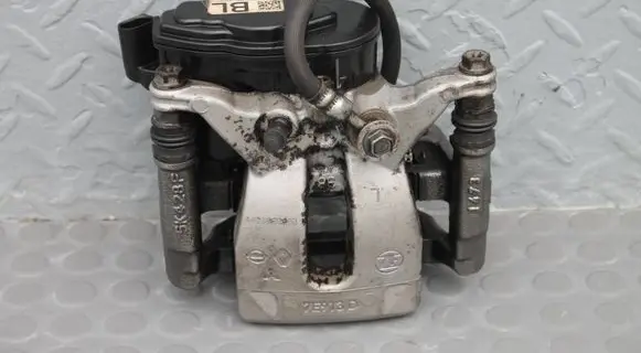 Nissan Qashqai J12 Rear brake caliper ZACISK-LEWY-TYLNY