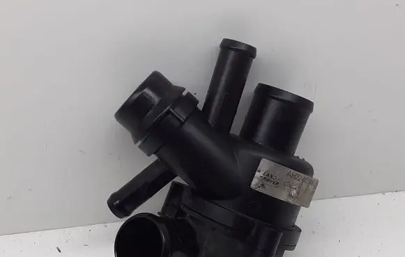 Thermostat/thermostat housing