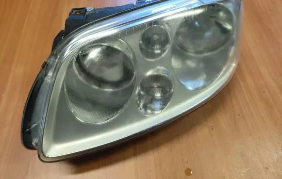 Volkswagen Touran I Headlight/headlamp 1T0941005F 0301205201