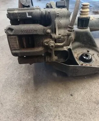Opel Astra L Rear brake caliper 