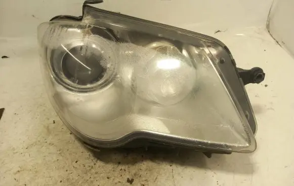 Volkswagen Touran I Headlight/headlamp 1300502031