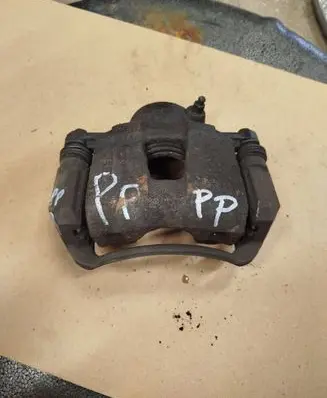 Suzuki Forenza Front brake caliper 