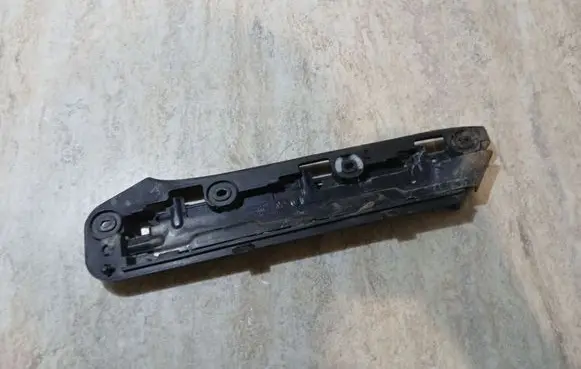Volkswagen Touran I Front bumper mounting bracket 1T0807936