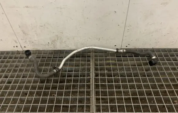Volkswagen Touareg II Engine coolant pipe/hose 7P0819911D 7P0819911