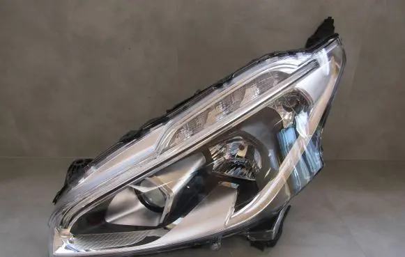 Peugeot 208 I Headlight/headlamp 9810805780