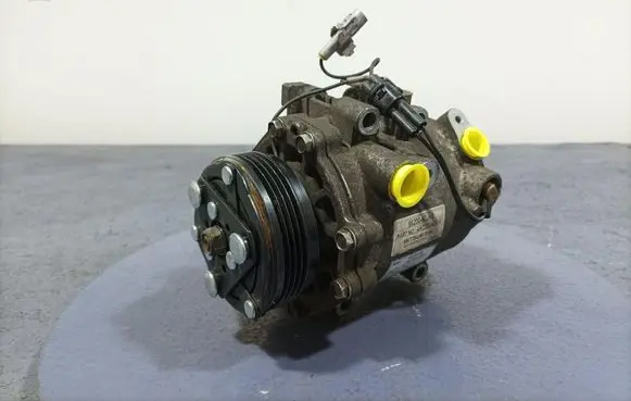 Suzuki Swift I Air conditioning (A/C) compressor (pump) 95200-62JA0