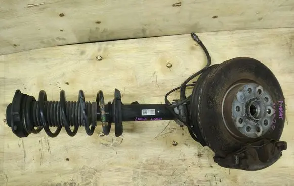 Volkswagen PASSAT B7 Front wheel hub spindle knuckle