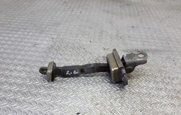 Nissan Primera Rear door check strap stopper