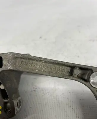 Audi A5 A/C compressor mount bracket 06M260885M