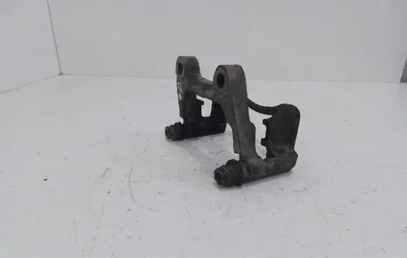 Volkswagen PASSAT B6 Brake caliper pad carrier rear 