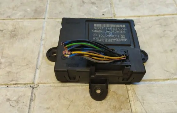 Ford Mondeo MK IV Door control unit/module 9G9T14B534AC 1002299801