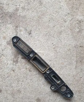 Volkswagen Touran I Trunk door license plate light bar 385943021E