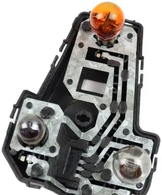 Tail light bulb cover holder