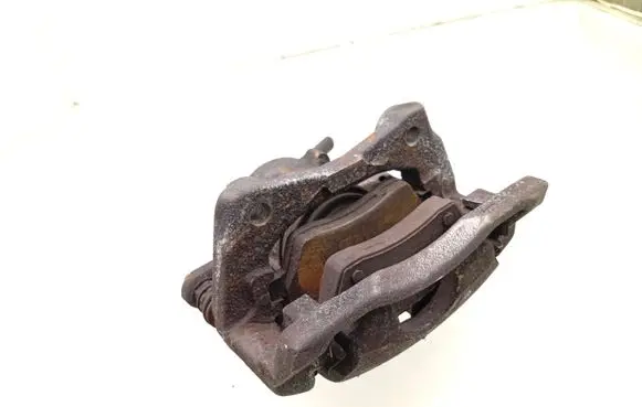 Nissan Note (E12) Front brake caliper 