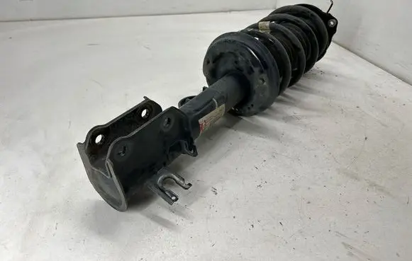 Dodge Hornet Front shock absorber with coil spring 68700004AA 27123 00505747620