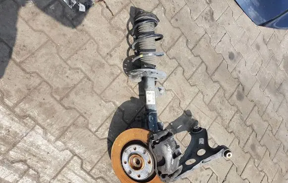Opel Corsa F Front wheel hub spindle knuckle 9837414380